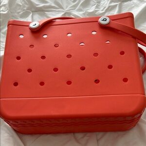 Bright orange Perforated Tote with Button-Strap